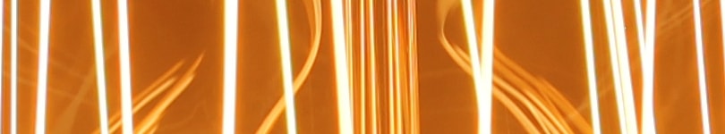 Close up shot of the glowing filaments of an elaborate edison bulb